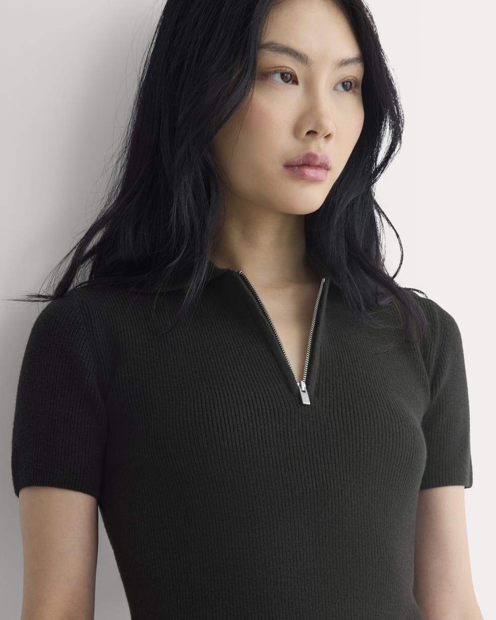 Knit Quarter-Zip Polo in Black — detail view