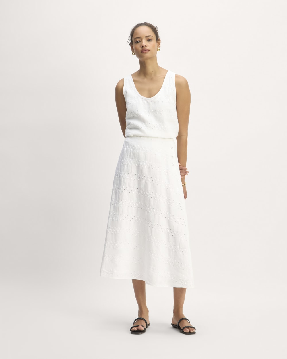 The Linen Eyelet Midi Skirt in White Eyelet — front view
