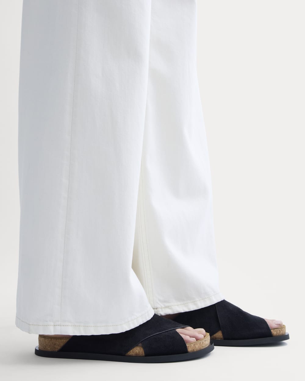 The Suede Crossover Sandal in Black — detail view