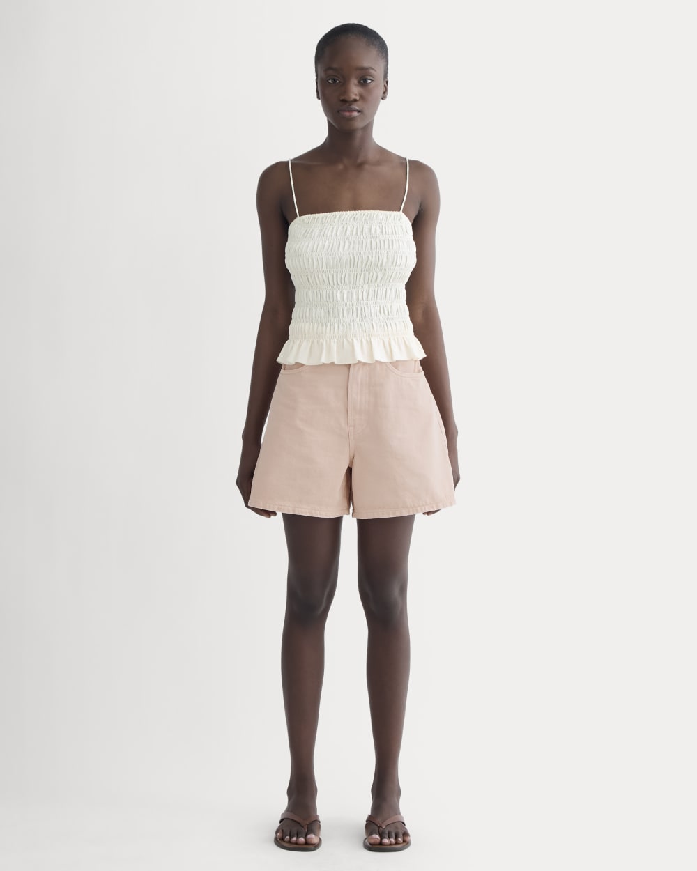 The A-Line Denim Short in Garment-Dyed Pink — front view