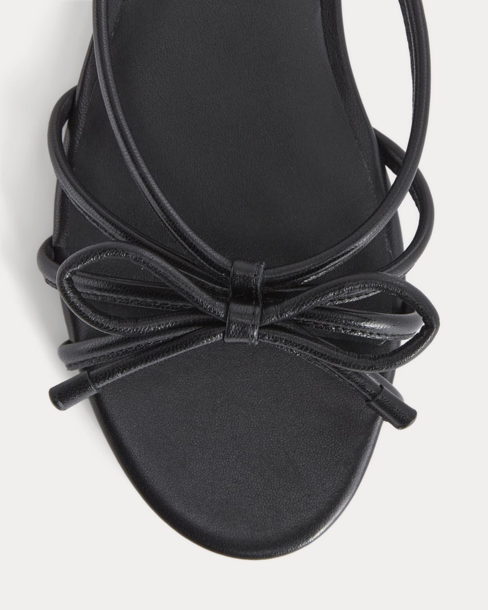 The Bow Sandal in Black — detail view
