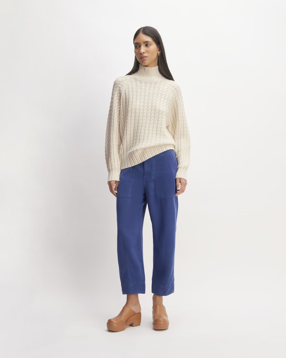 The Cotton Merino Cable Turtleneck in Canvas — detail view
