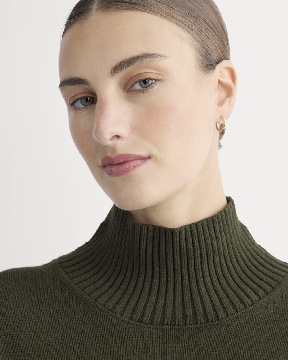 The Boxy Turtleneck in Everyday Cotton in Dark Green — detail view