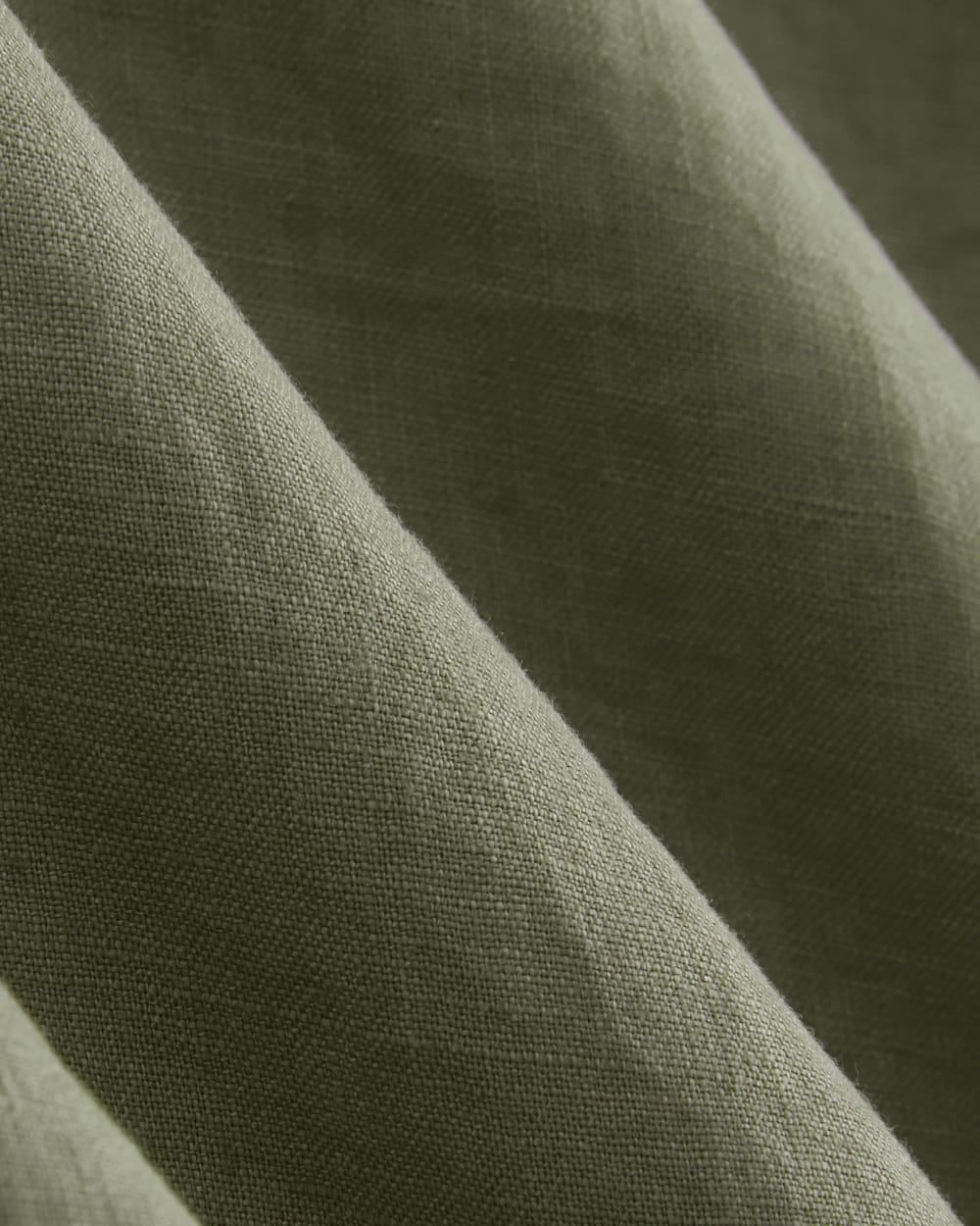 The Muscle Top in Linen in Sage Green — detail view