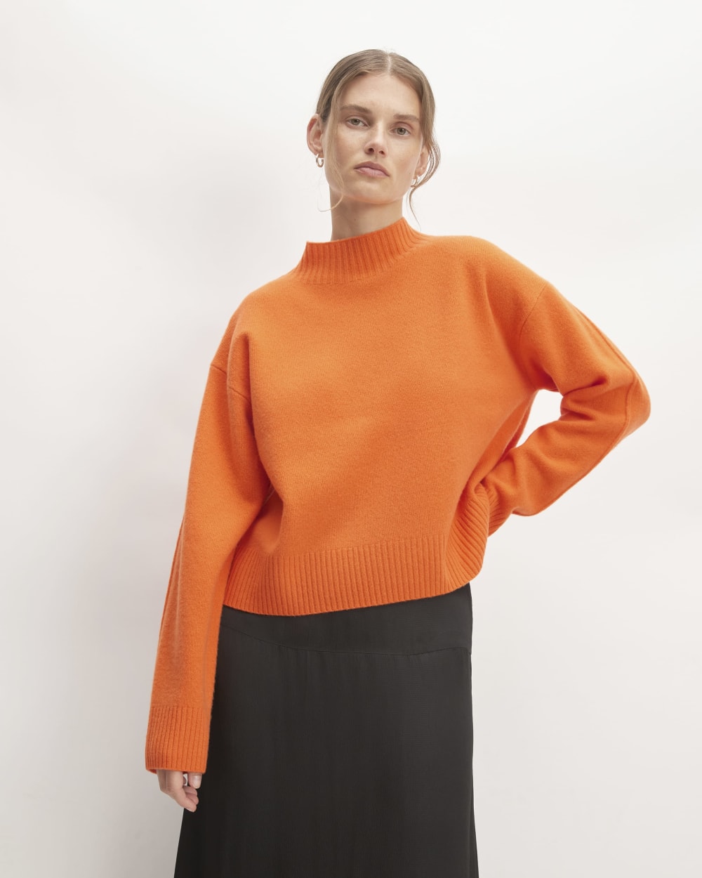The Good Merino Wool Mockneck Sweater in Orange — front view