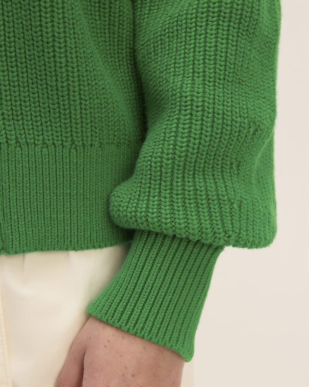 The Boxy Cardigan in Everyday Cotton in Grass Green — detail view
