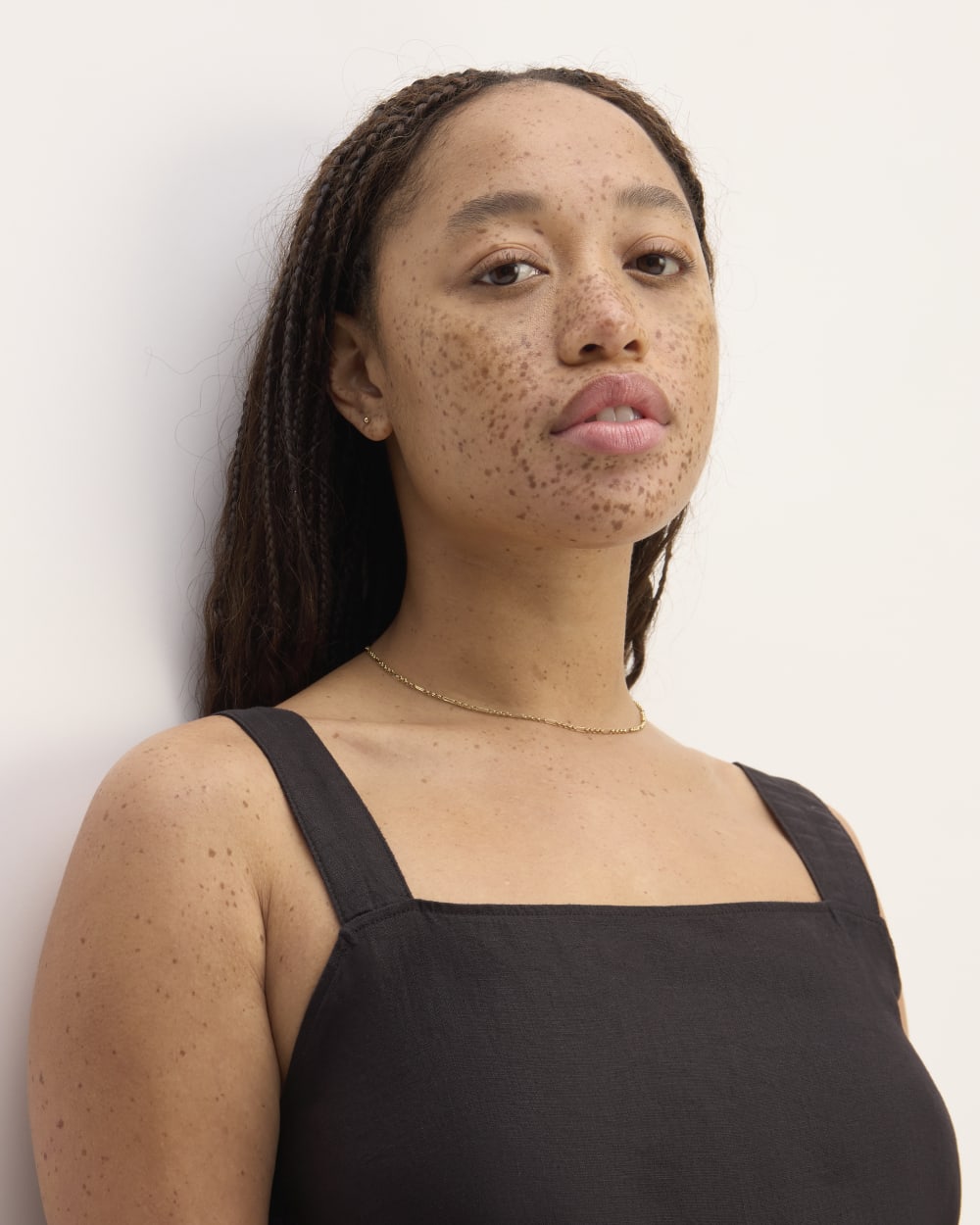The Linen Side-Button Jumpsuit in Black — detail view