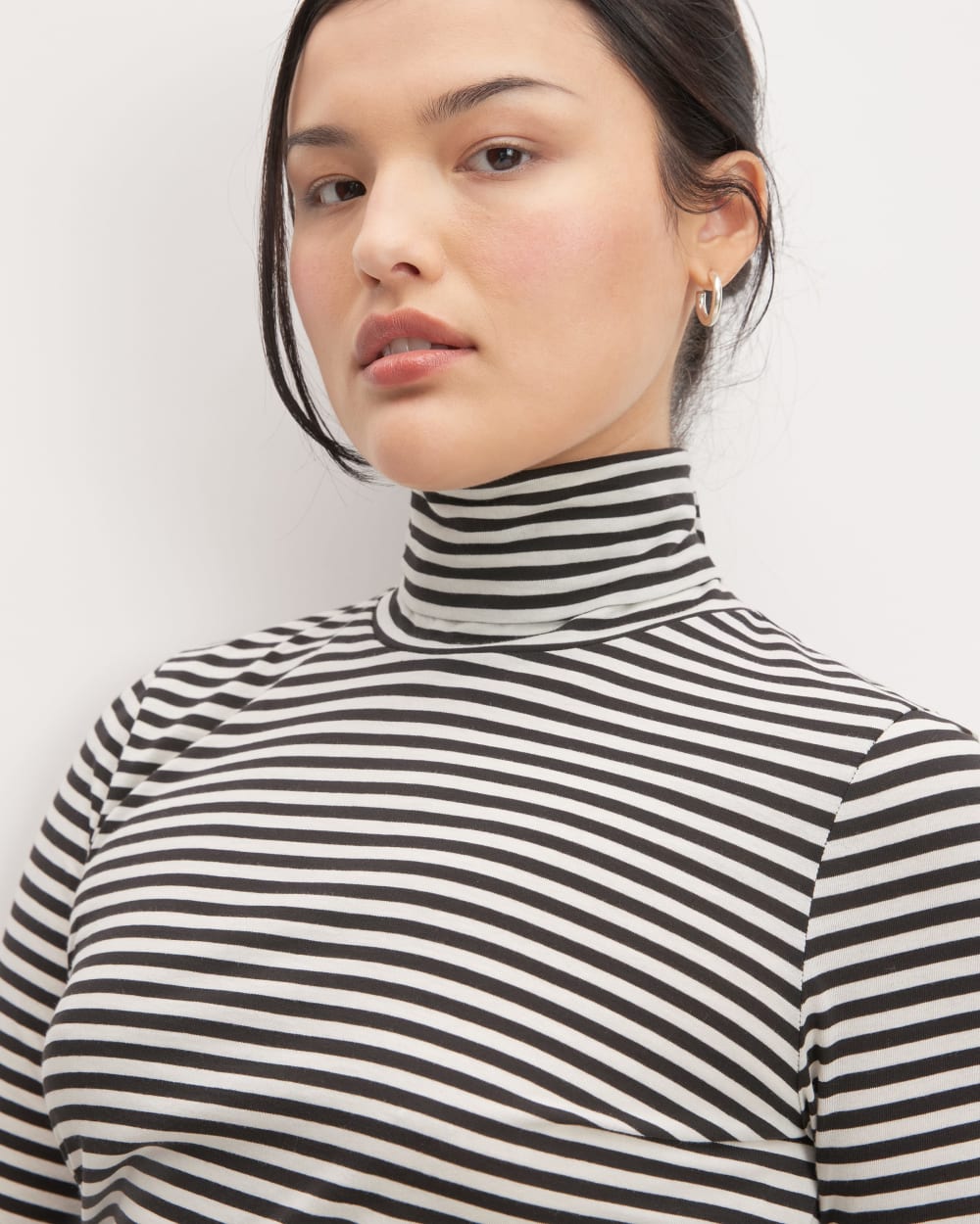 The Organic Cotton Turtleneck in Black / Bone — detail view