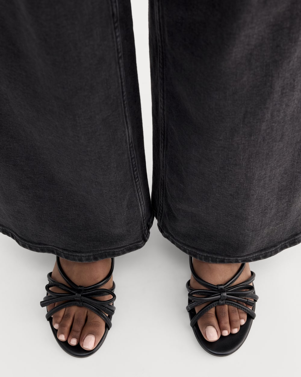 The Bow Sandal in Black — detail view