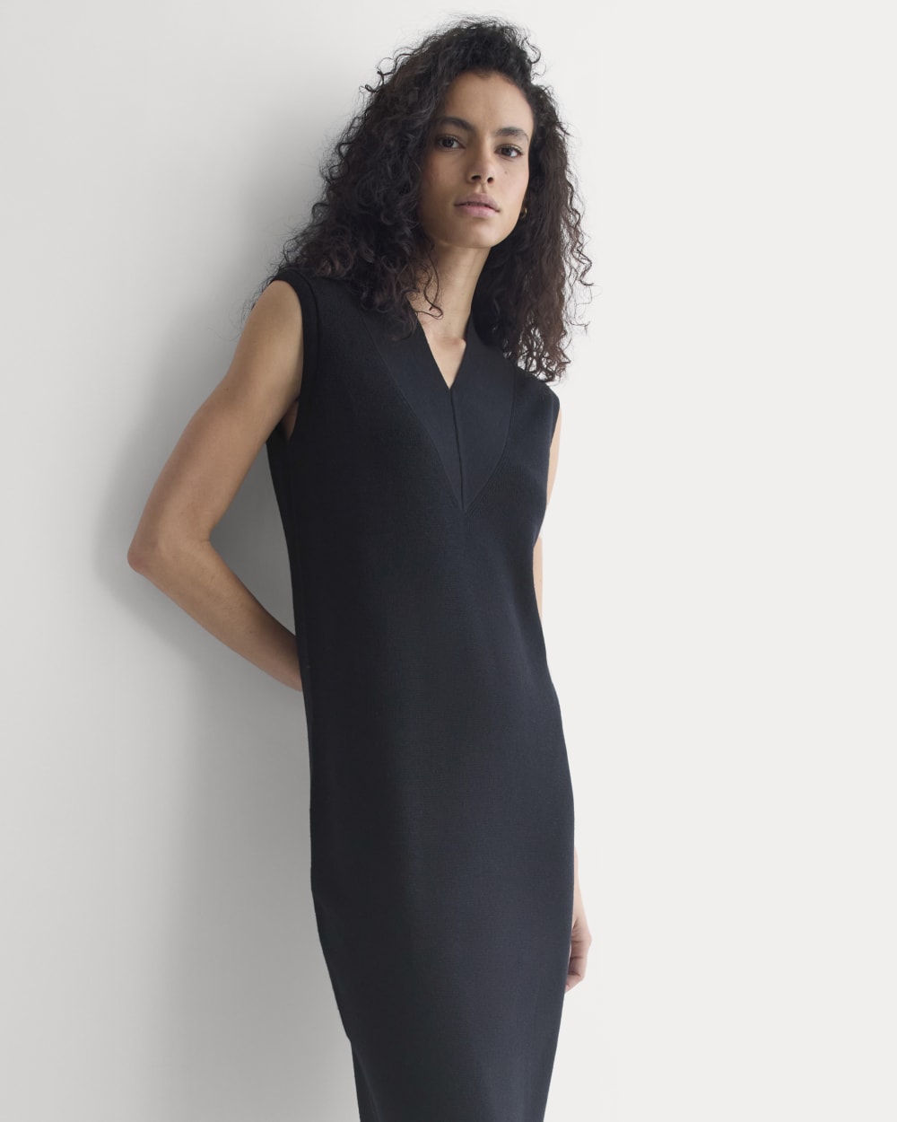 Relaxed V-Neck Midi Sweater Dress in Cotton Merino in Black — detail view