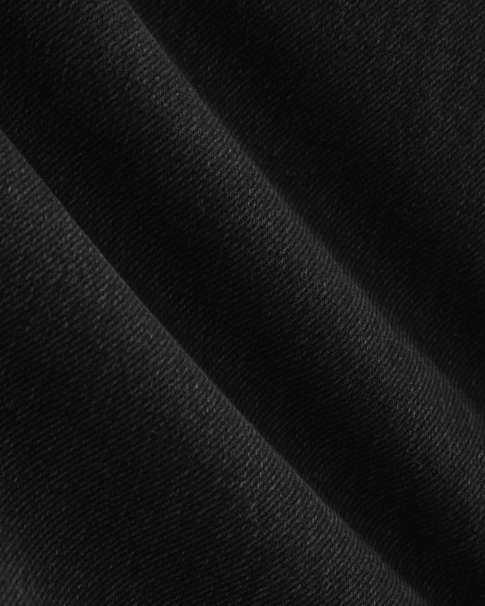 Relaxed Mid-Rise Bootcut Jean in Black — detail view