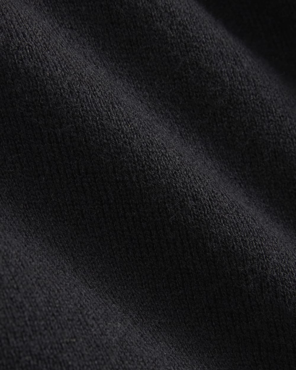 Oversized Polo Sweater in Cotton Merino in Black — detail view