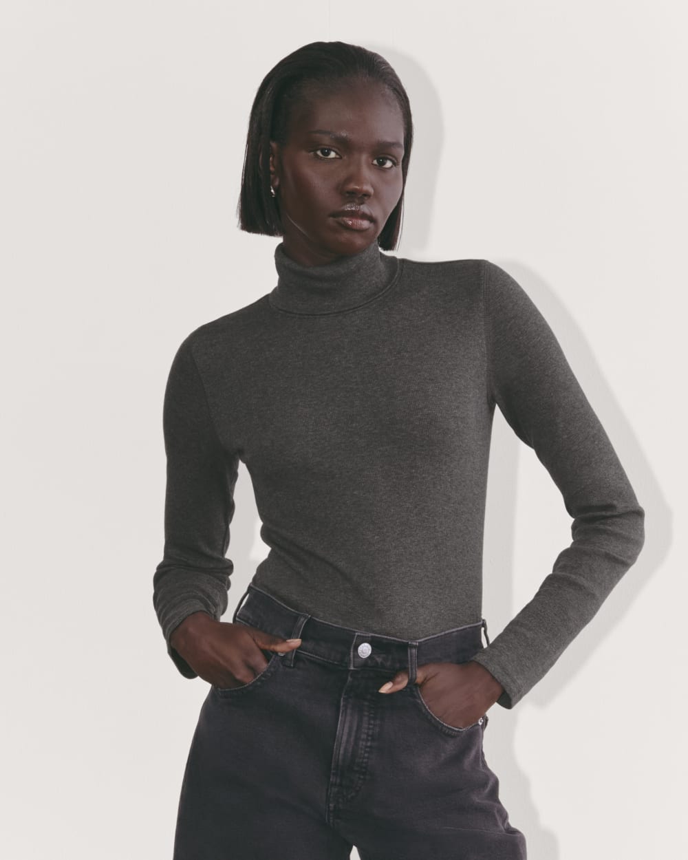 The Luxe Rib Turtleneck in Heathered Soot — front view