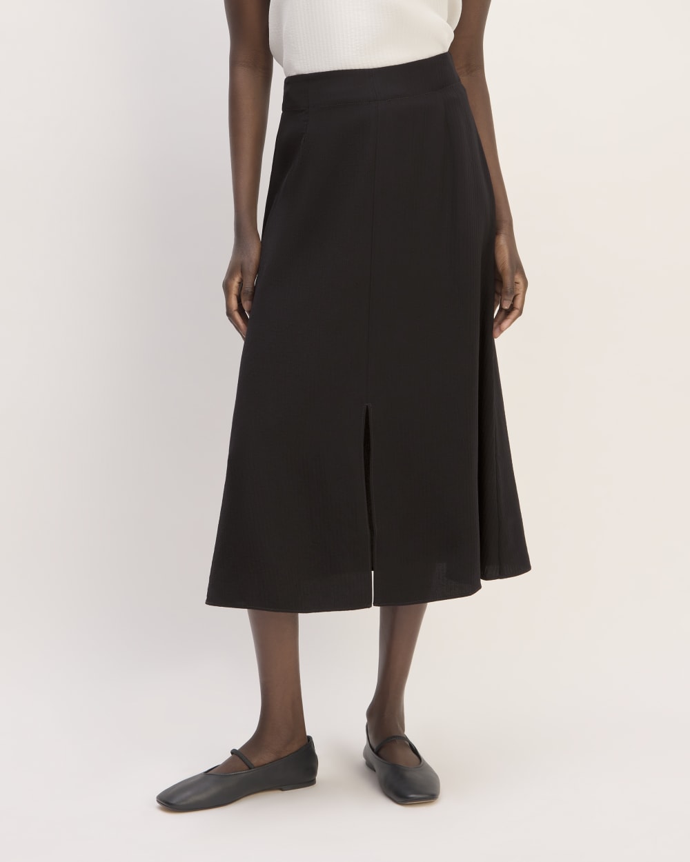 The Mini Jacquard Stripe Slip Skirt in Black — detail view