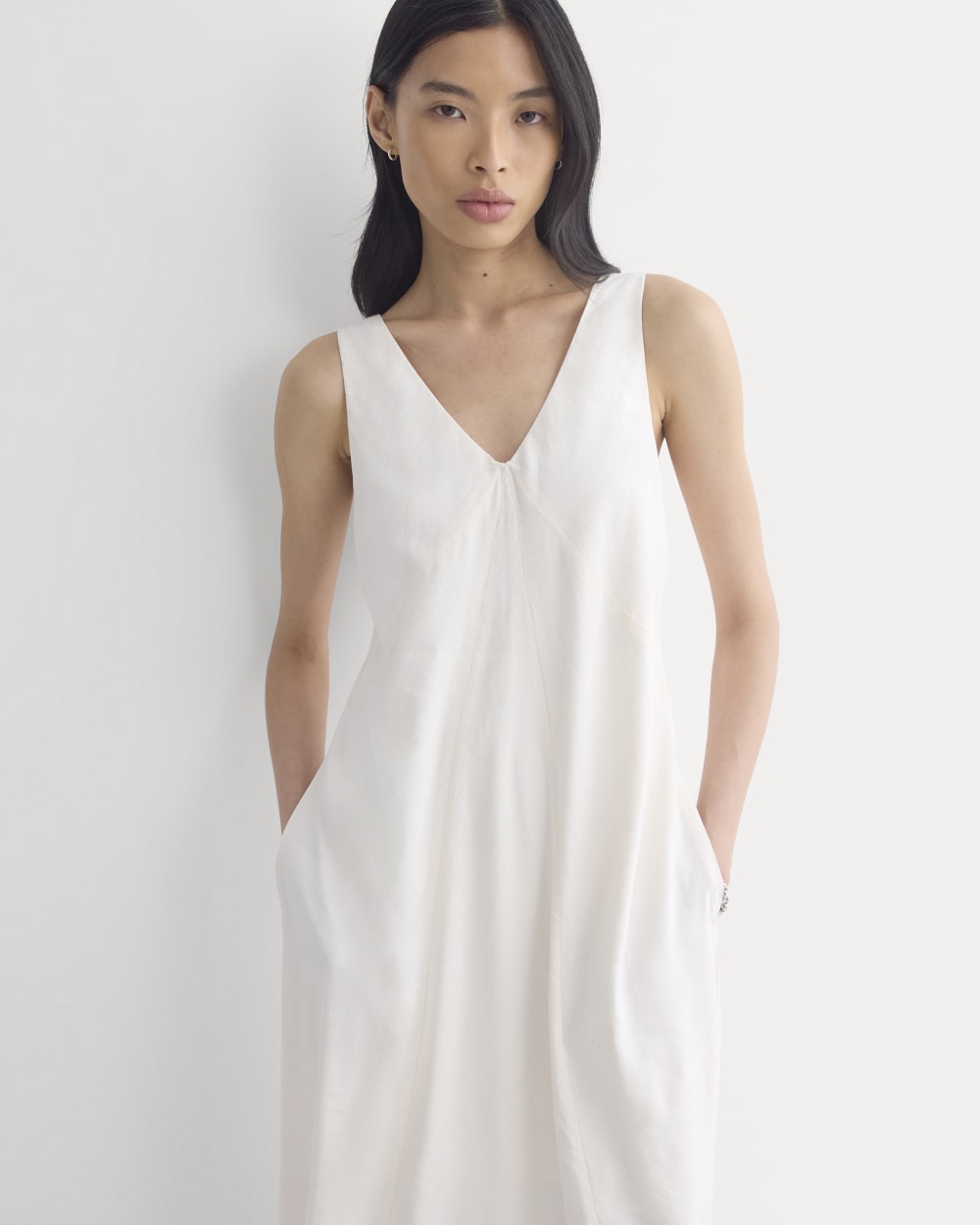 Deep V Seamed Dress in Stretch Linen in Bone — detail view