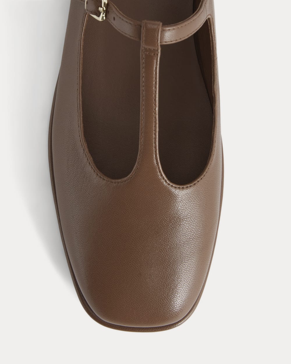The Leather T-Strap Flat in Rum — detail view