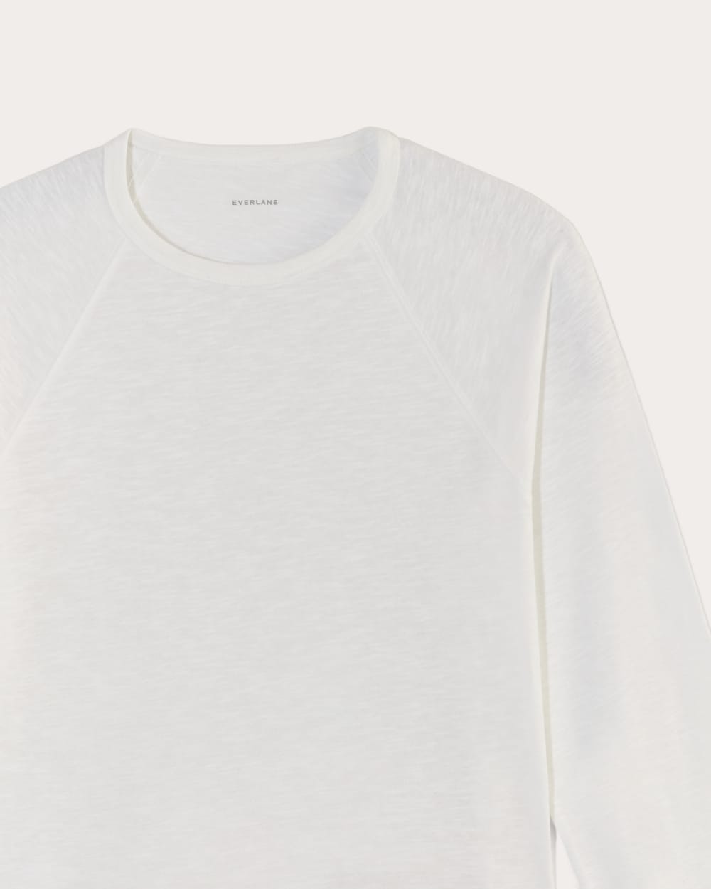 The Perform Crew Tee in White — detail view