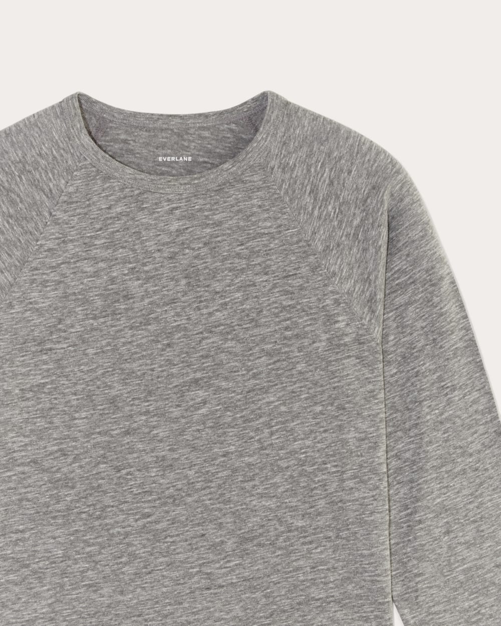 The Perform Crew Tee in Heathered Grey — detail view