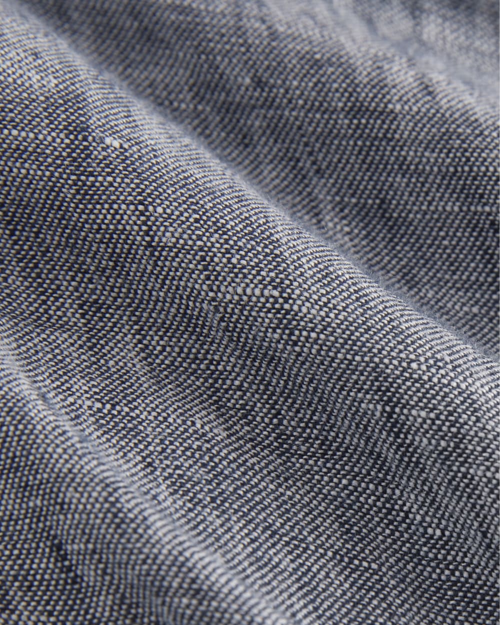 The Utility Coverall in Linen in Navy Chambray — detail view