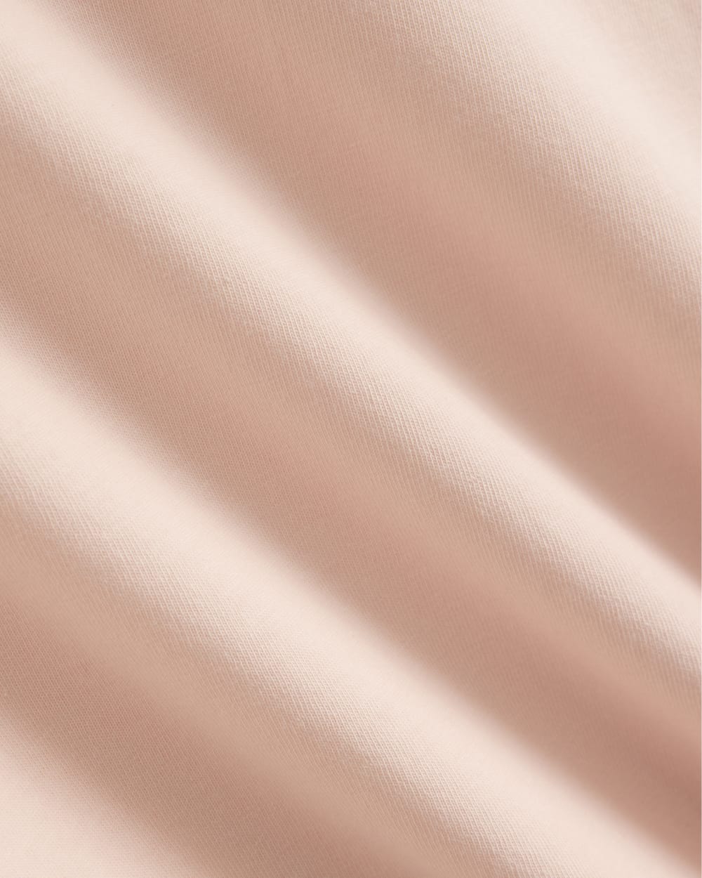 The Box-Cut Tee in Essential Cotton in Pale Peach — detail view