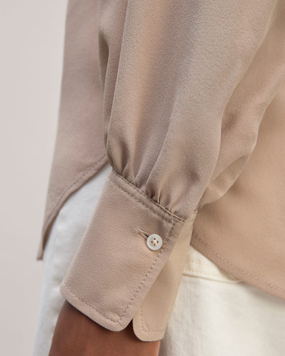The Henley Shirt in Washable Silk in Burnt Sugar — detail view