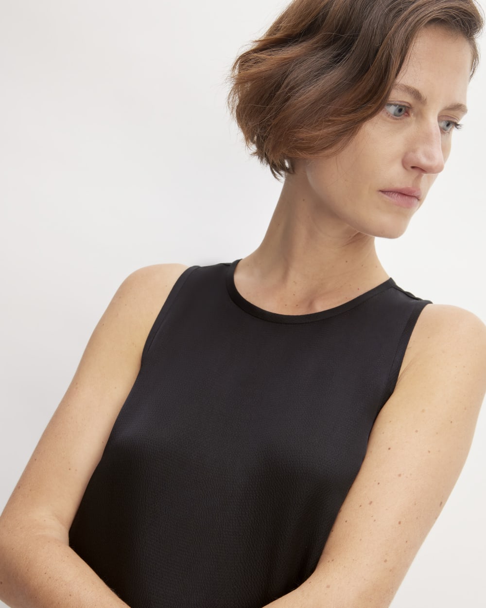 The Satin Racerback Slip Dress in Black — detail view