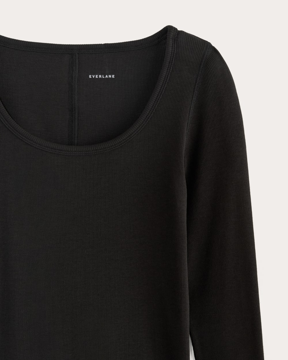 The Luxe Rib Long-Sleeve Scoop-Neck Tee in Black — detail view
