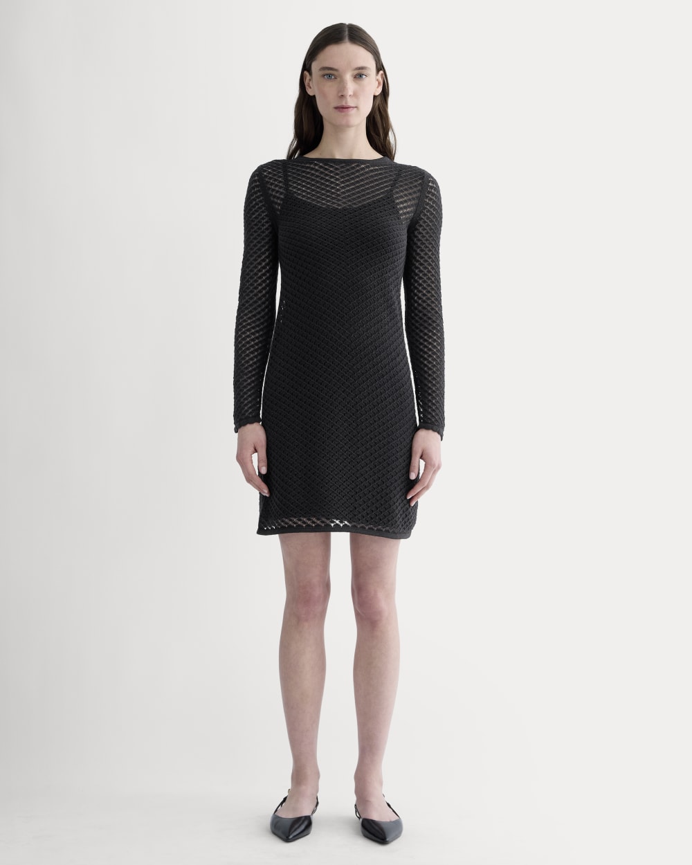 The Lace Knit Mini Dress in Black — front view