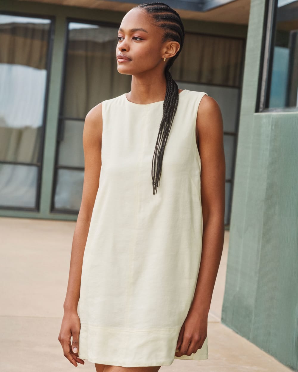 The Shift Dress in Stretch Linen in Light Yellow — detail view