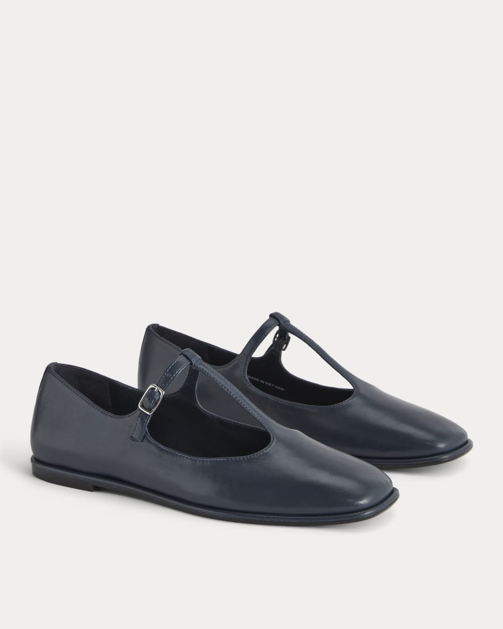 The Leather T-Strap Flat in Navy — detail view
