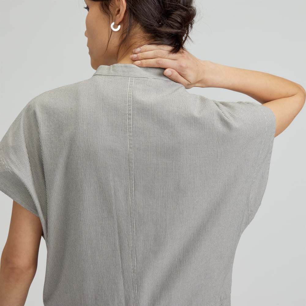 The Easy Workwear Jumpsuit in Canvas Tan / Navy — detail view