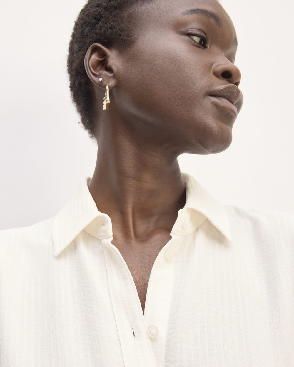 The Mini Jacquard Stripe Shirt Dress in Bone — detail view