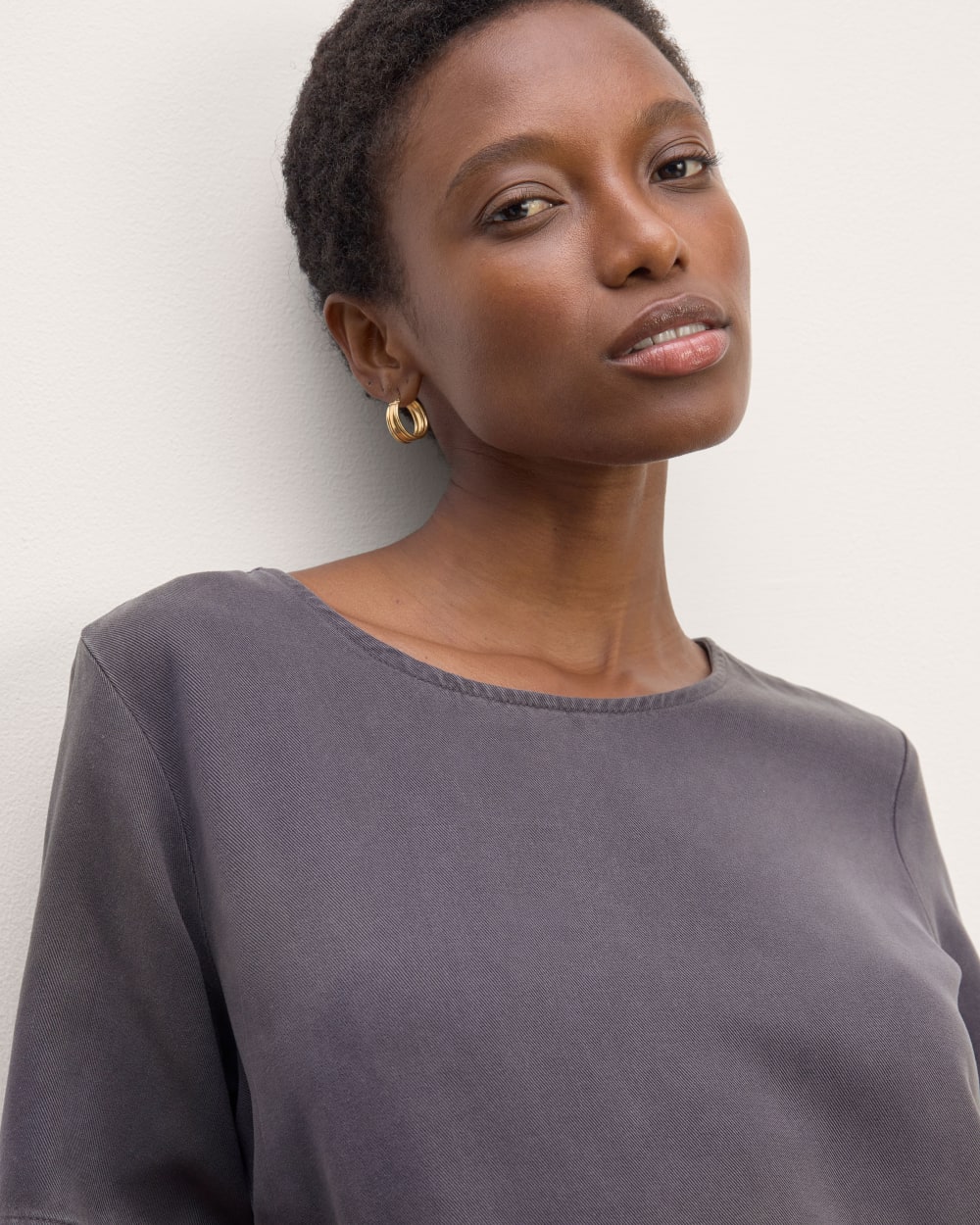 The Relaxed T-Shirt Dress in Buttersoft in Graphite — detail view
