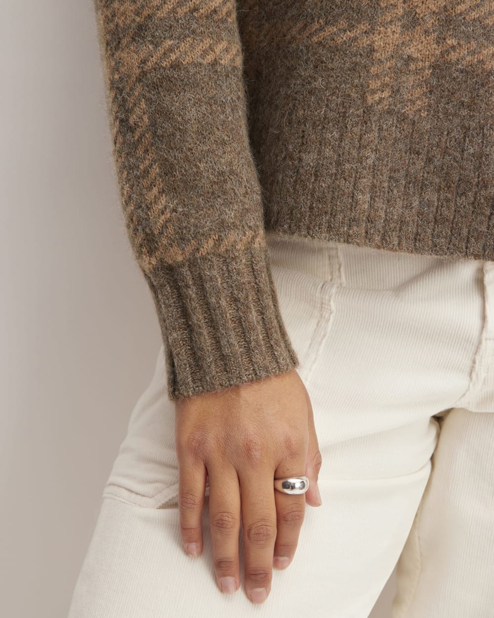 The Alpaca Cropped Crewneck Sweater in Cocoa / Tiger's Eye — detail view