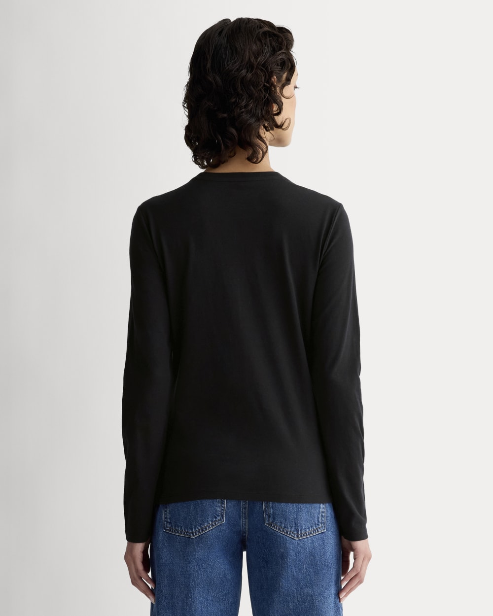 The Slim Long-Sleeve Crew in Essential Cotton in Black — detail view