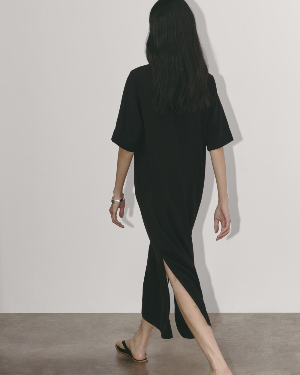 The Relaxed T-Shirt Dress in Buttersoft in Black — detail view