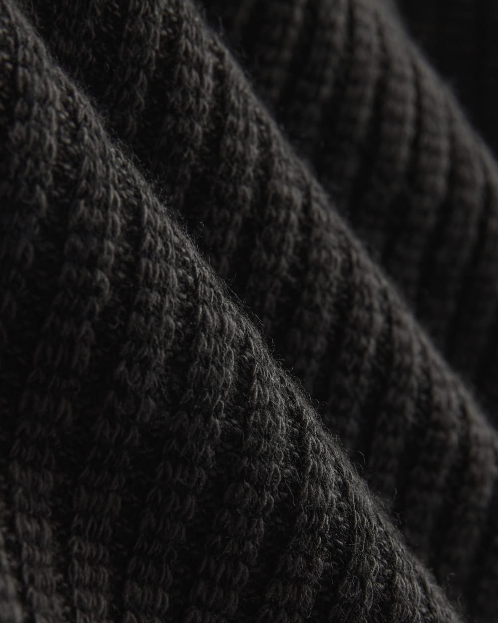 The Cozy Rib Funnel-Neck in Black — detail view