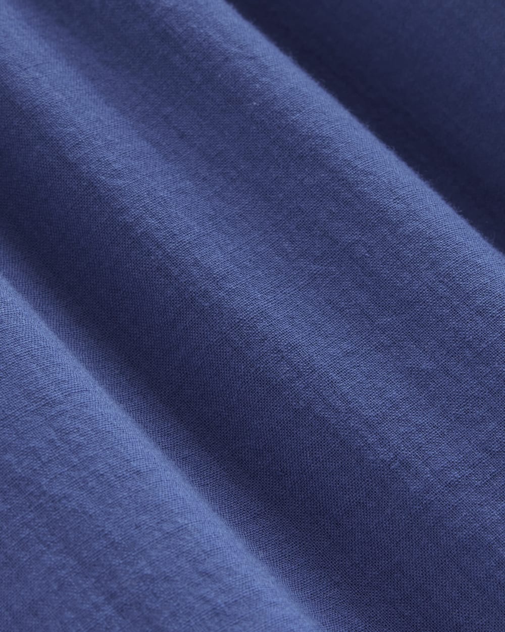 The Gauze Tiered Dress in Mazarine Blue — detail view