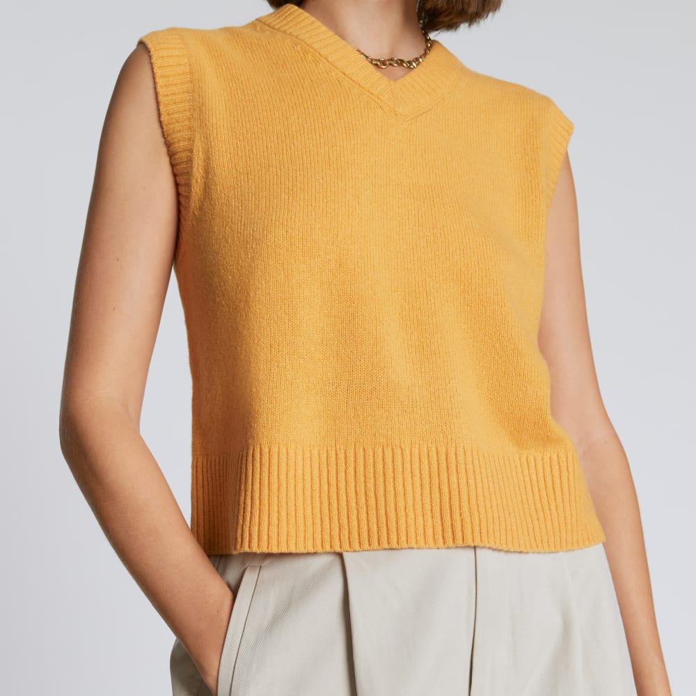 The Cashmere Vest in Kumquat — detail view