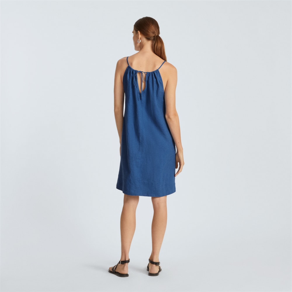 The Linen Apron Dress in Deep Blue — detail view