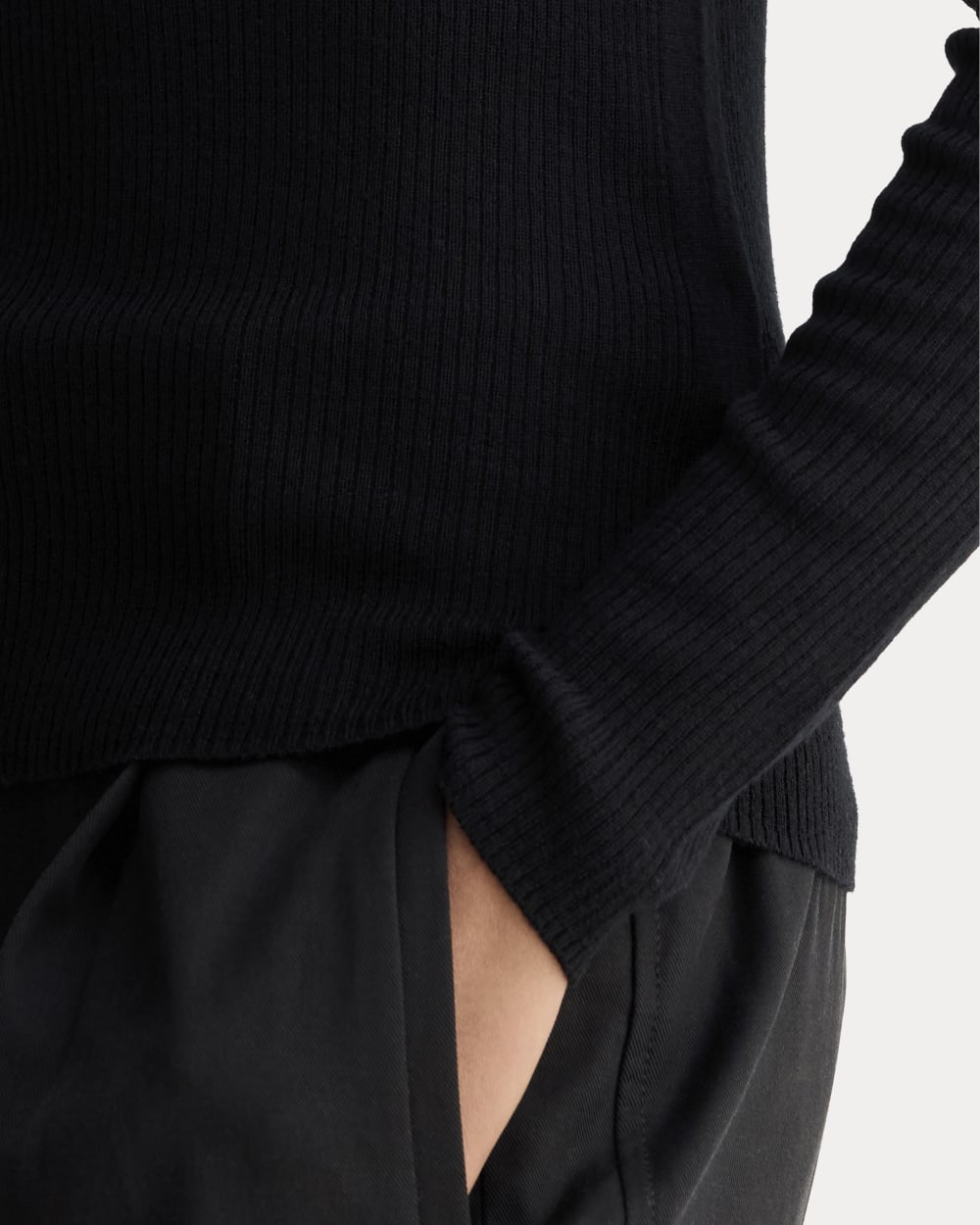 The Polo in Ultrasoft Merino in Black — detail view