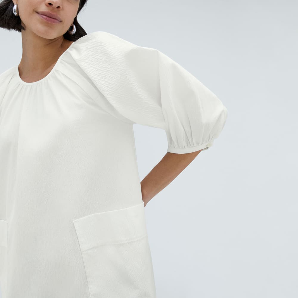 The Seersucker Puff Sleeve Dress in White — detail view