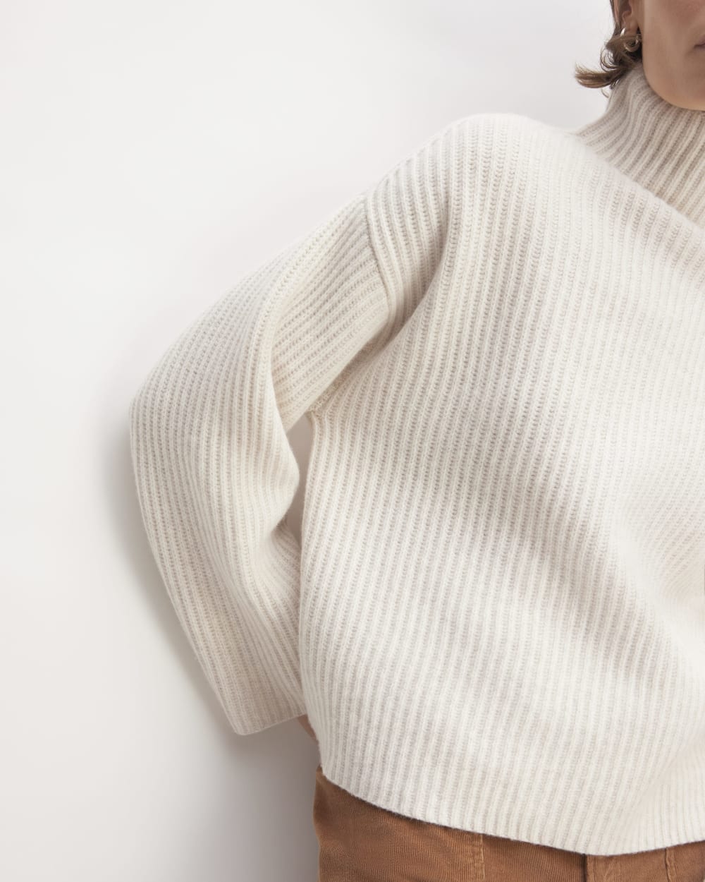 The Felted Merino Funnel-Neck Pullover in Heathered Oat — detail view