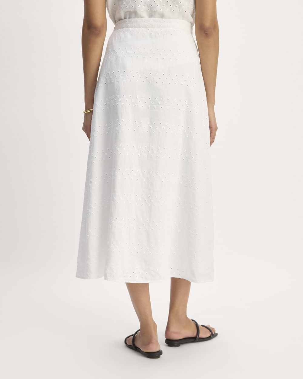 The Linen Eyelet Midi Skirt in White Eyelet — detail view