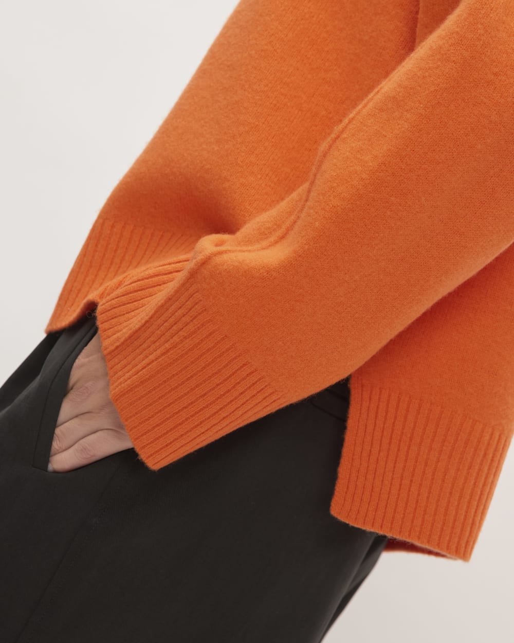The Good Merino Wool Crewneck Sweater in Orange — detail view