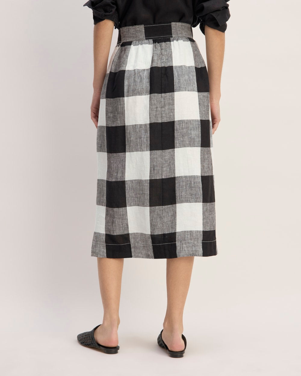 The Linen Wrap Skirt in Bone / Black Check — detail view