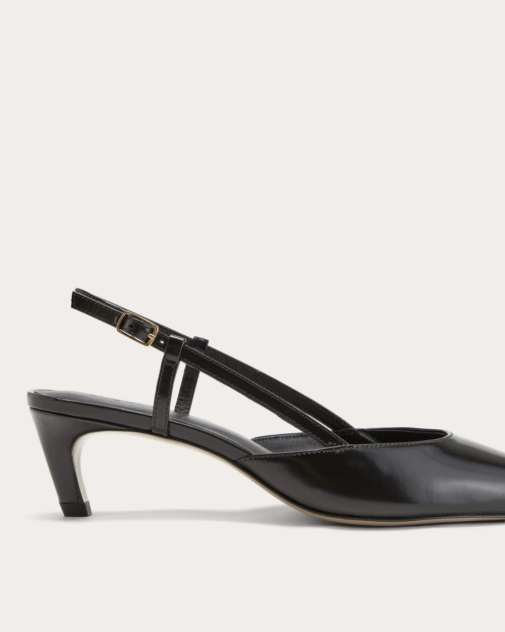 The Studio Slingback Heel in Black — detail view