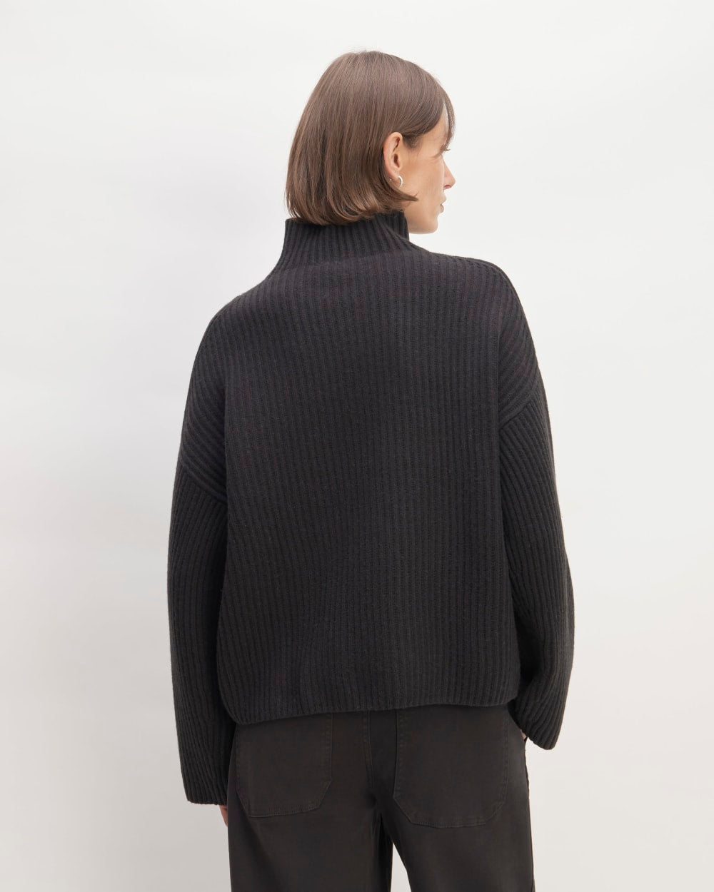 The Felted Merino Funnel-Neck Pullover in Black — detail view