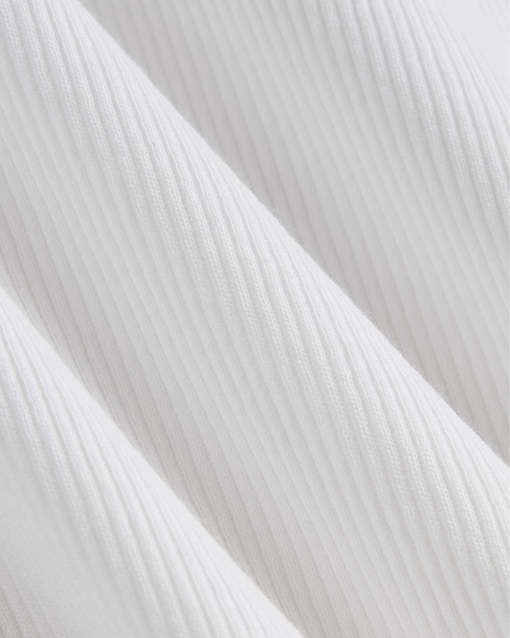 The Luxe Rib Funnel-Neck Tank in White — detail view