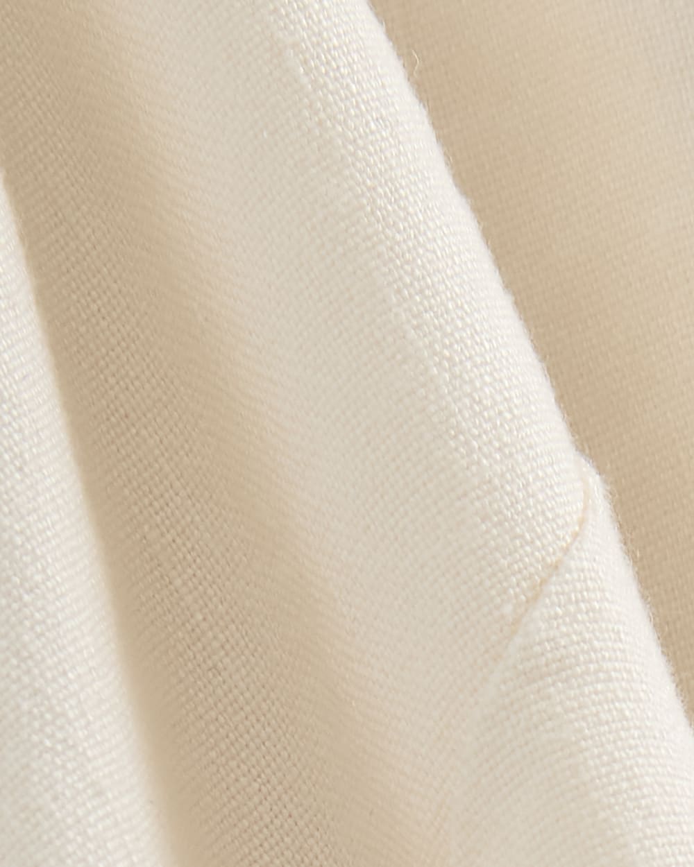 The Shift Dress in Stretch Linen in Bone — detail view